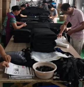Wholesale dog products factory workers checking dog mats for OEM order